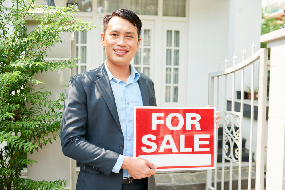 Australian real estate professional using AML compliance software for property transactions